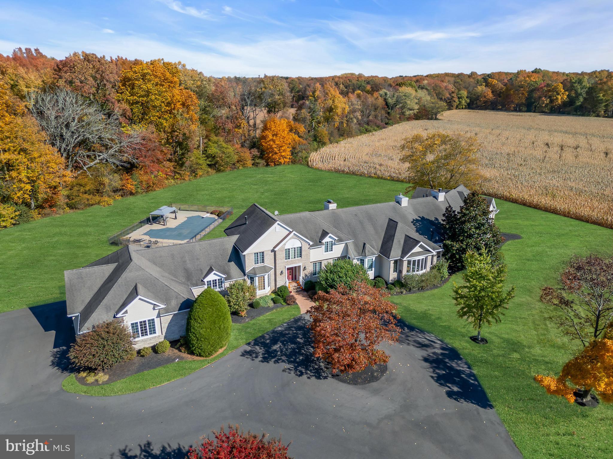 an aerial view of a house with a garden