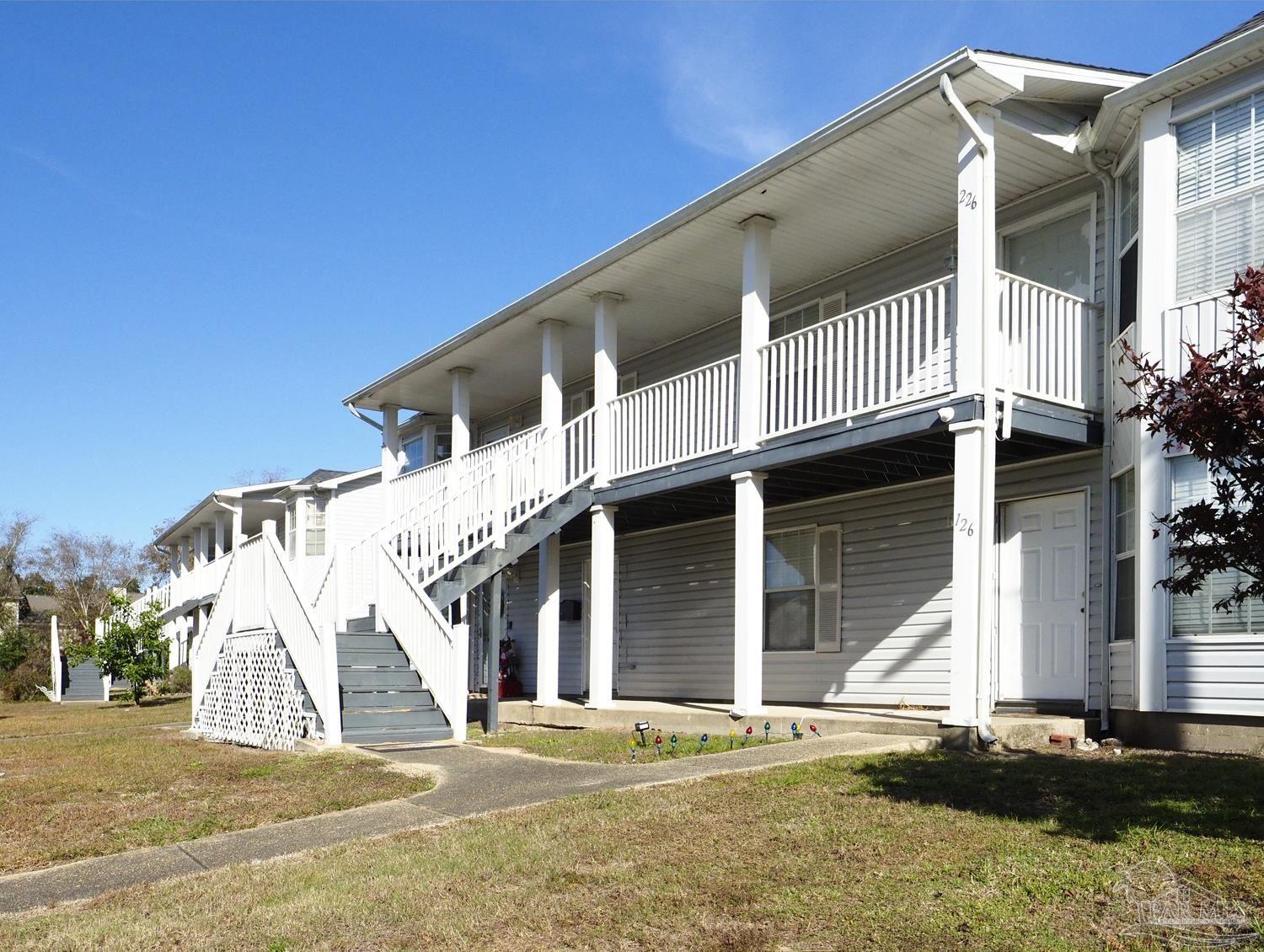 a view of a house with a patio