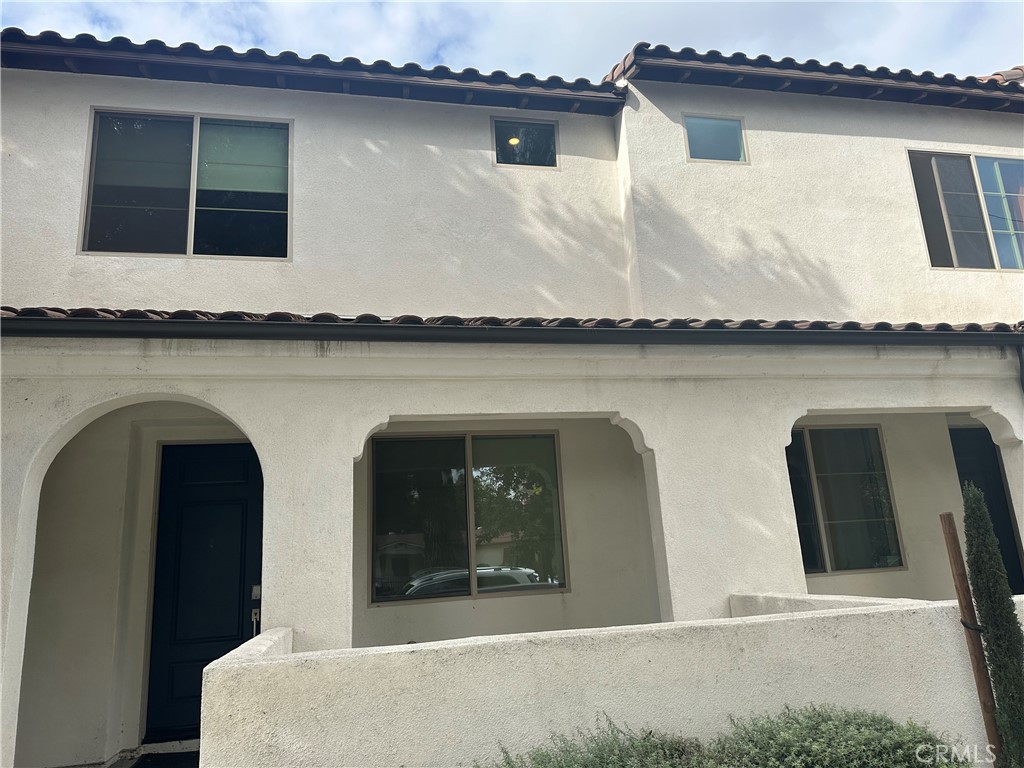 a front view of a house with balcony