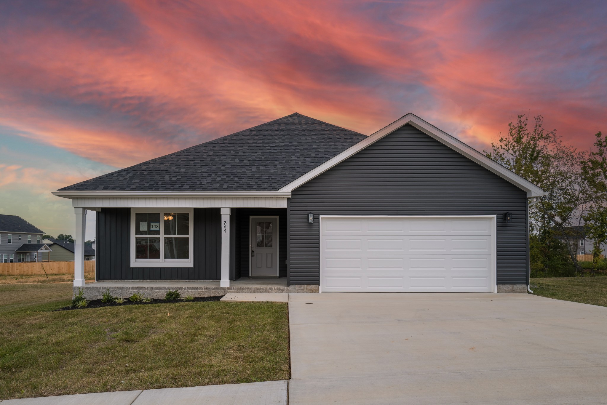 front view of a house with a dry yard