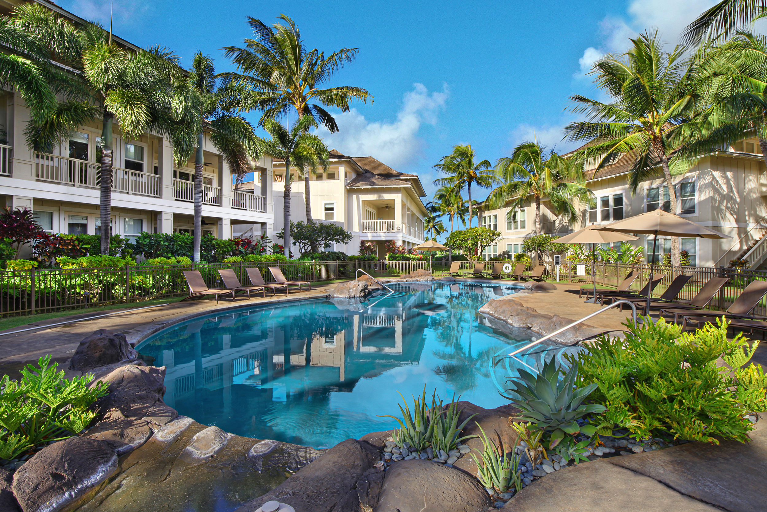 a view of a swimming pool with a patio