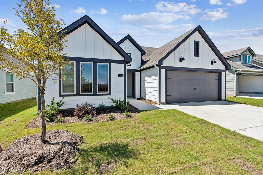 a front view of a house with yard