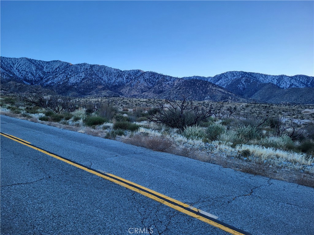 a view of mountains and valleys