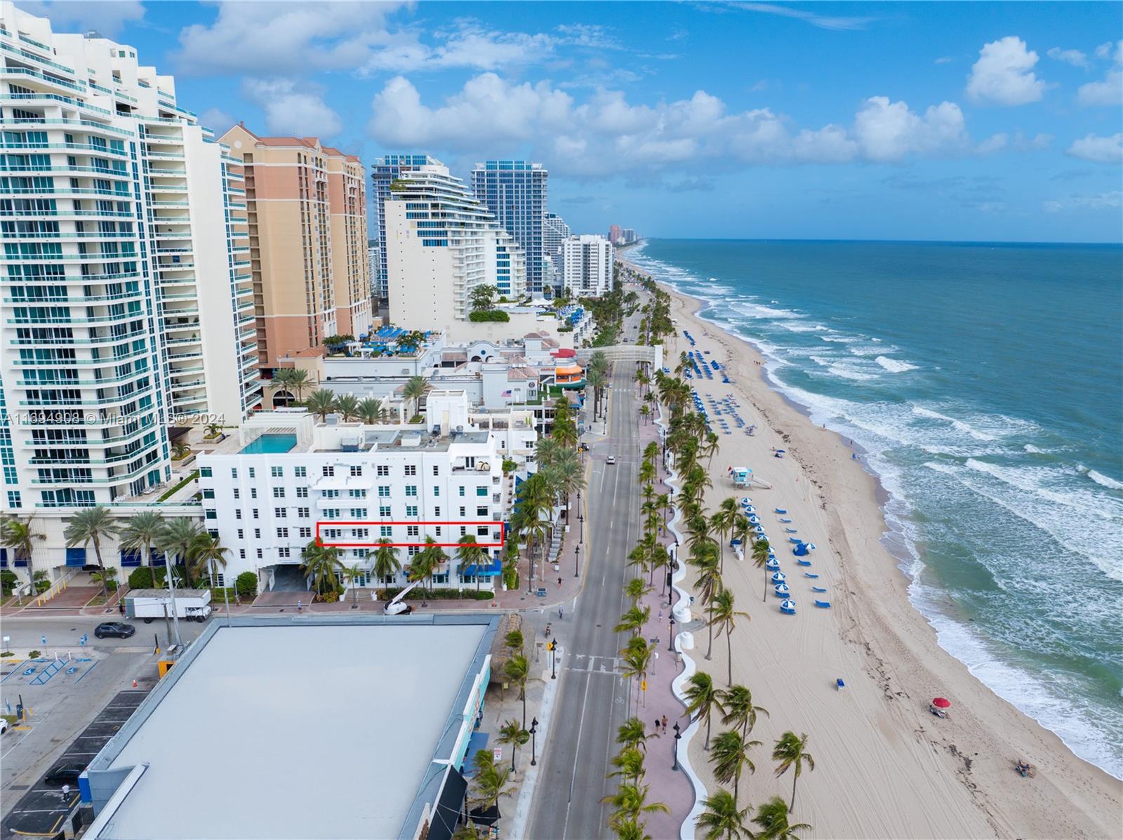 a view of city with ocean