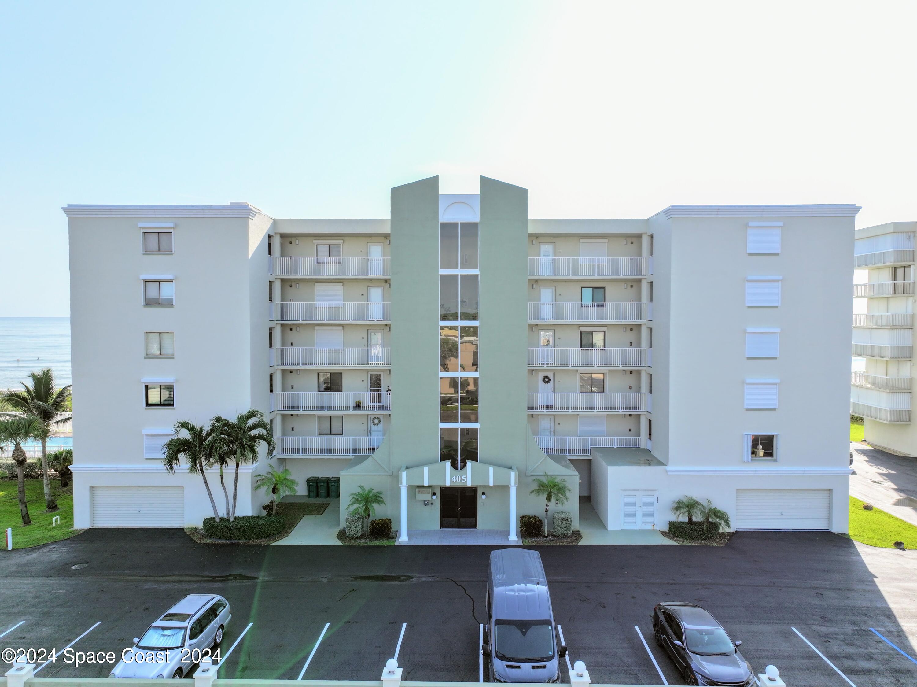 a front view of a building with street view