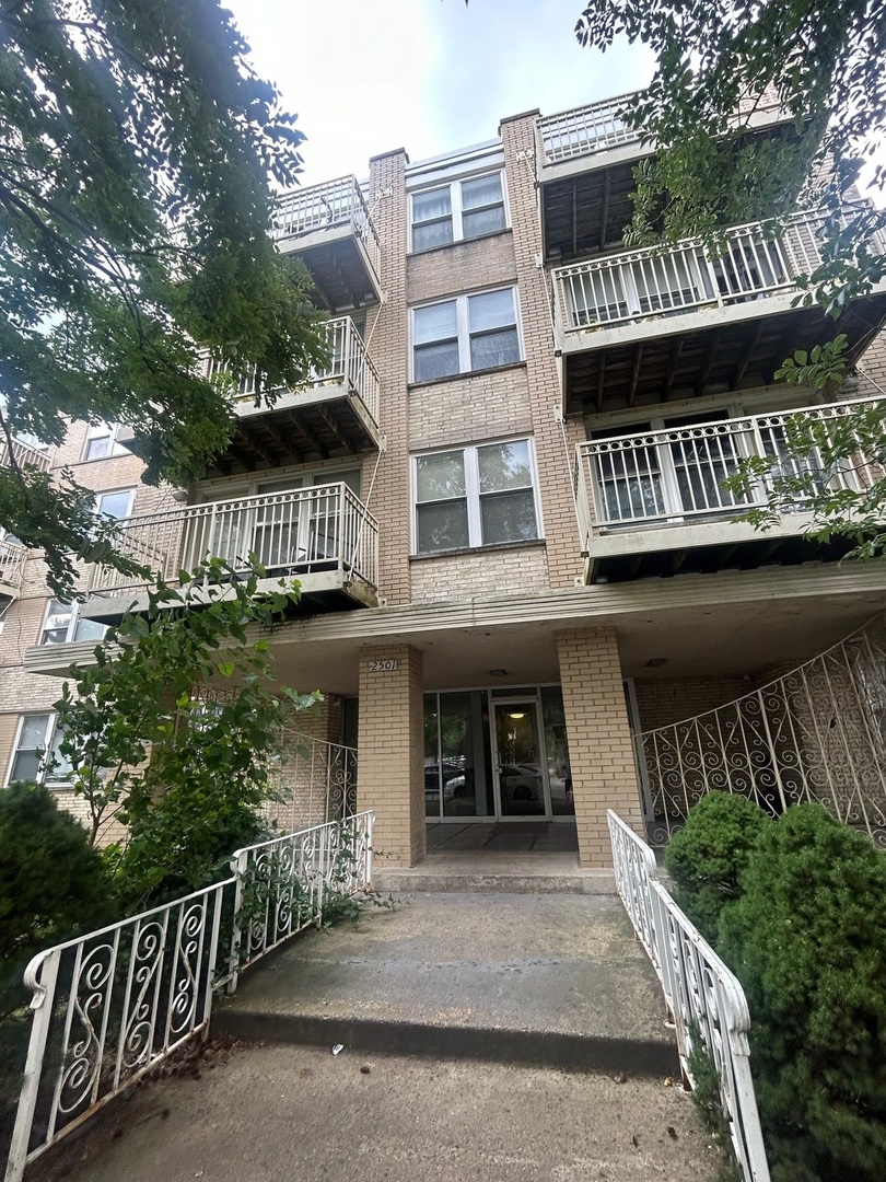 a front view of a house with balcony