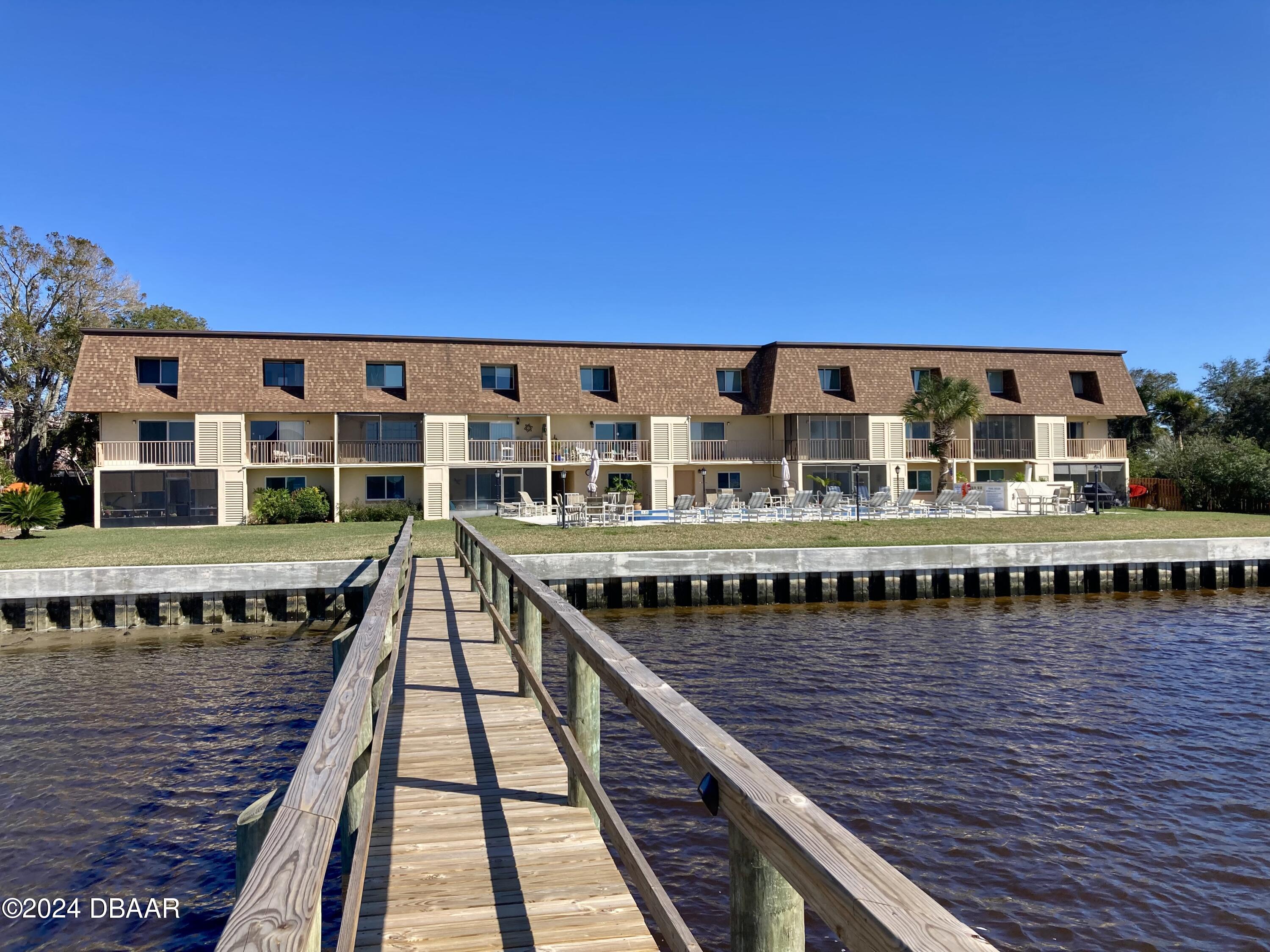 a view of a large building with a ocean view