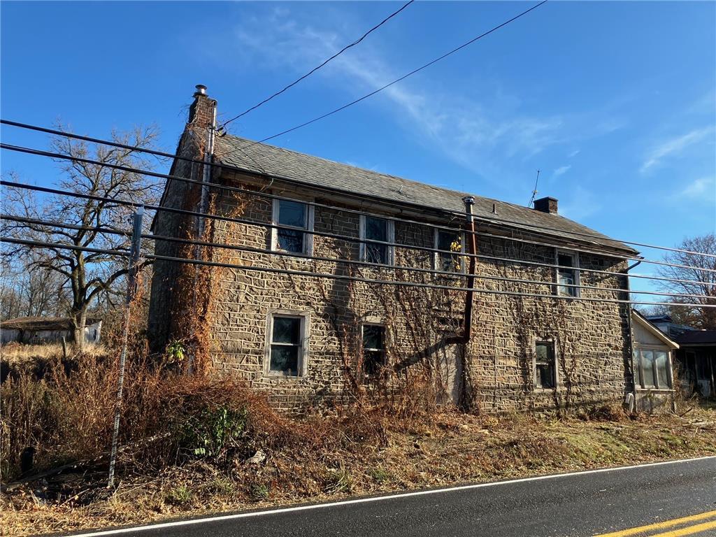 front view of a house with a small yard