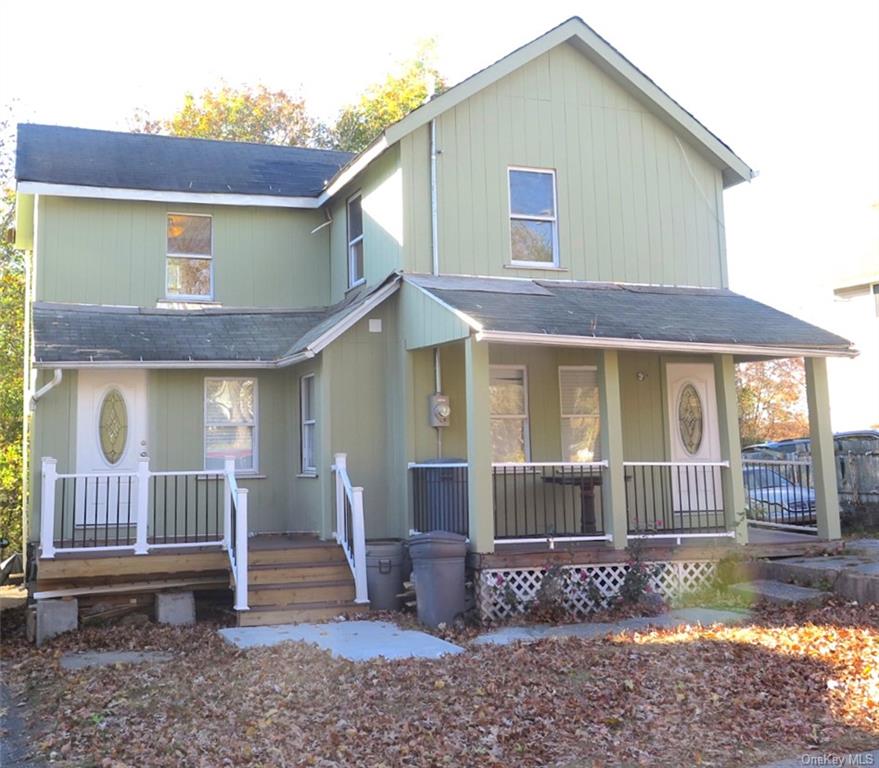 View of front of property featuring covered porch