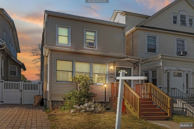 a front view of a house with parking