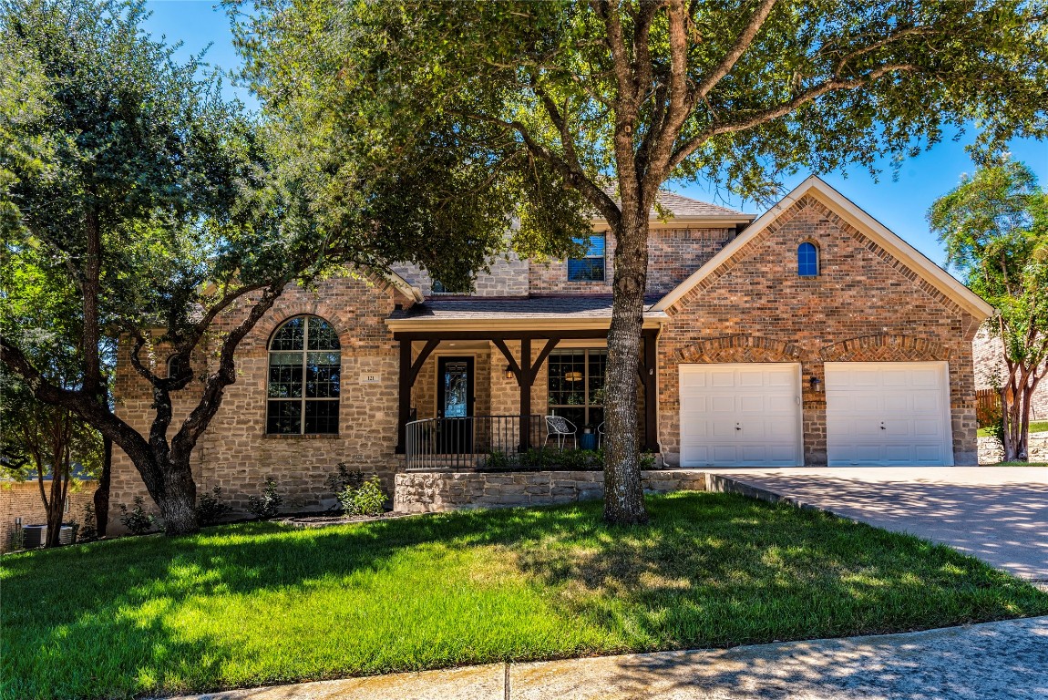 front view of a house with a yard