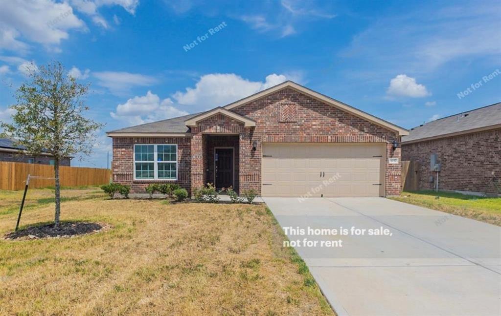 a view of a house with a sink and yard