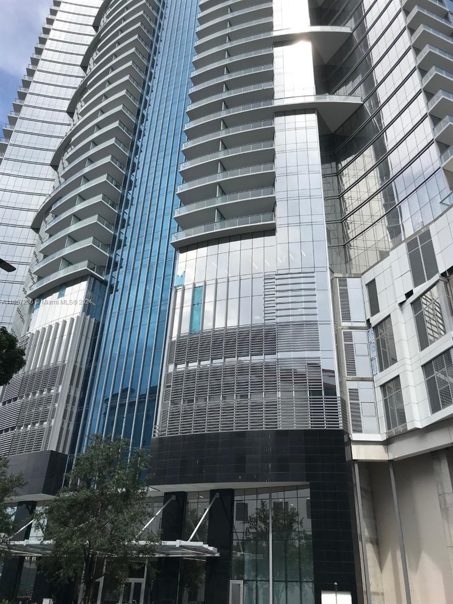 a front view of a building with balcony