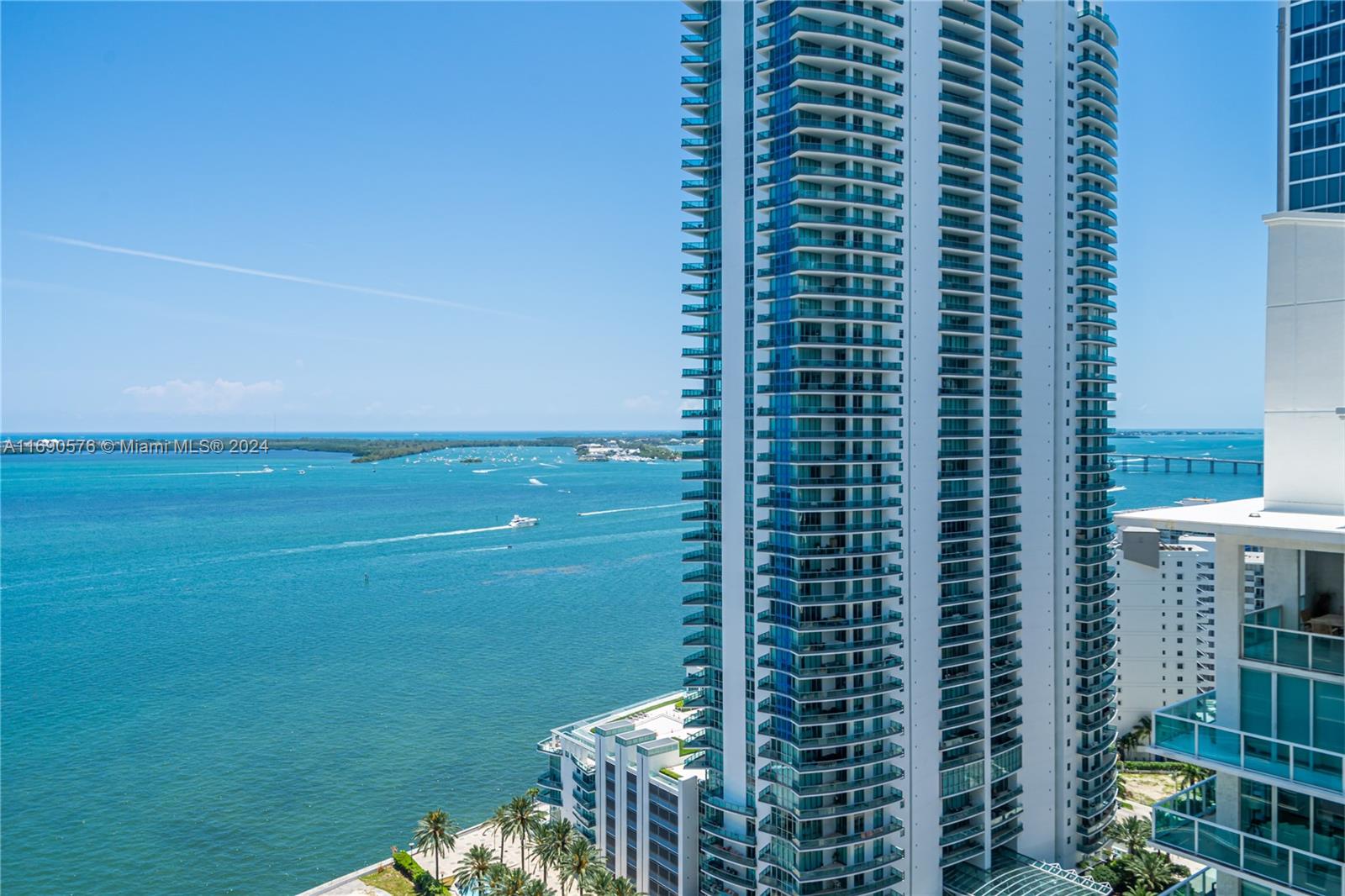 a view of a balcony with an ocean view