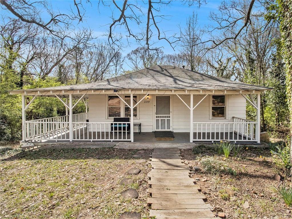 front view of a house with a small yard