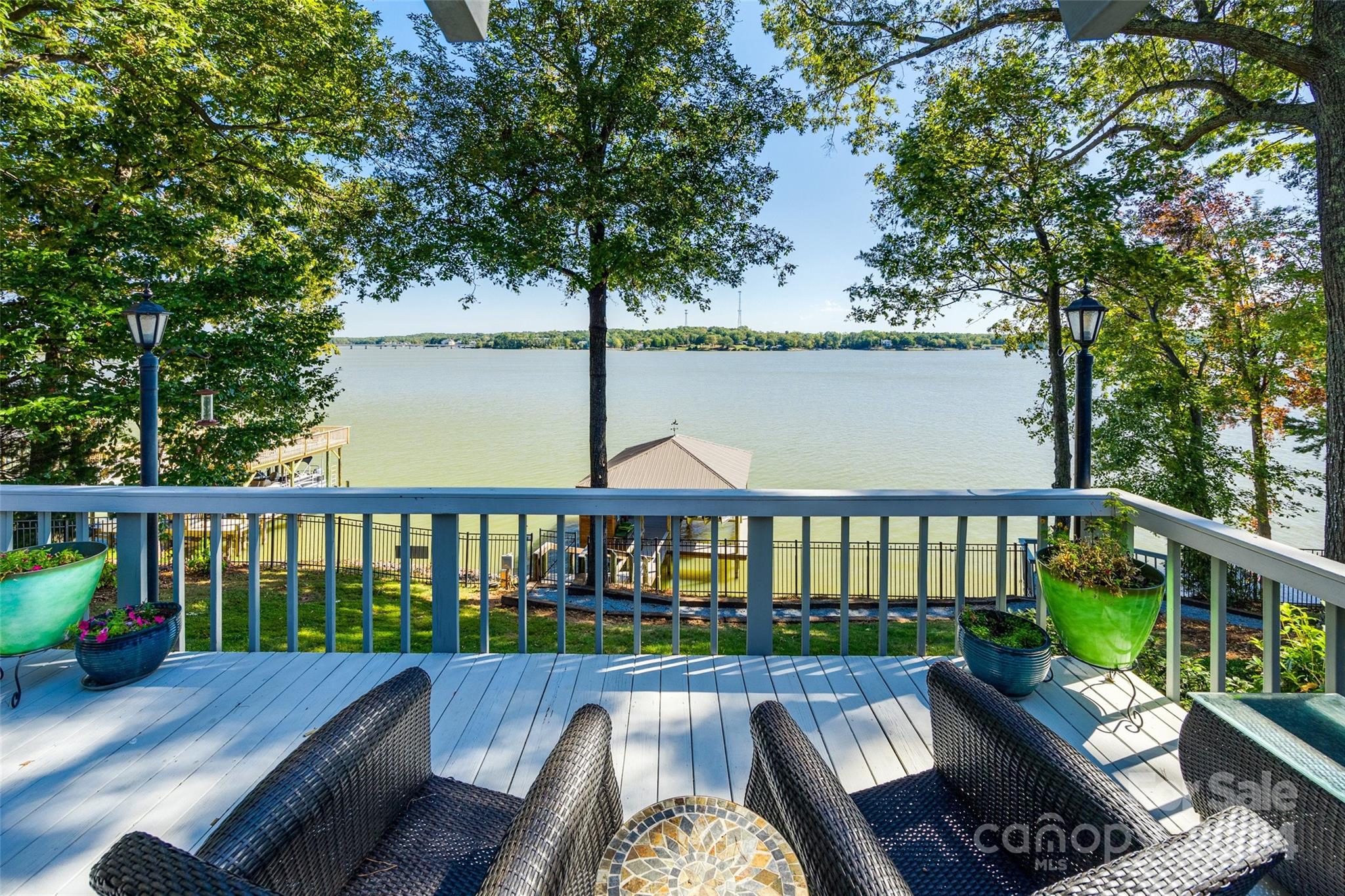 a view of a chairs on the deck