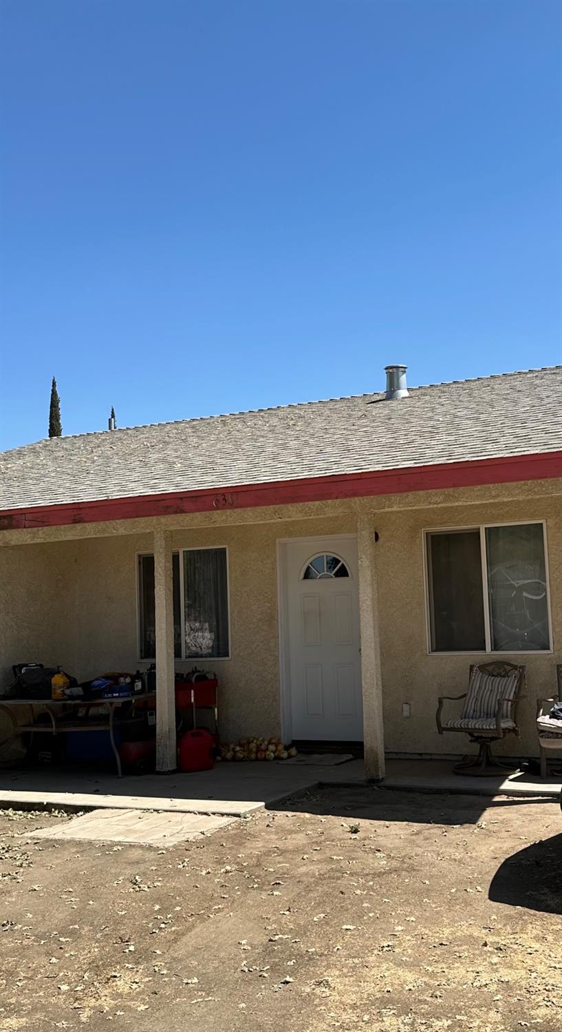 a view of a house with a patio