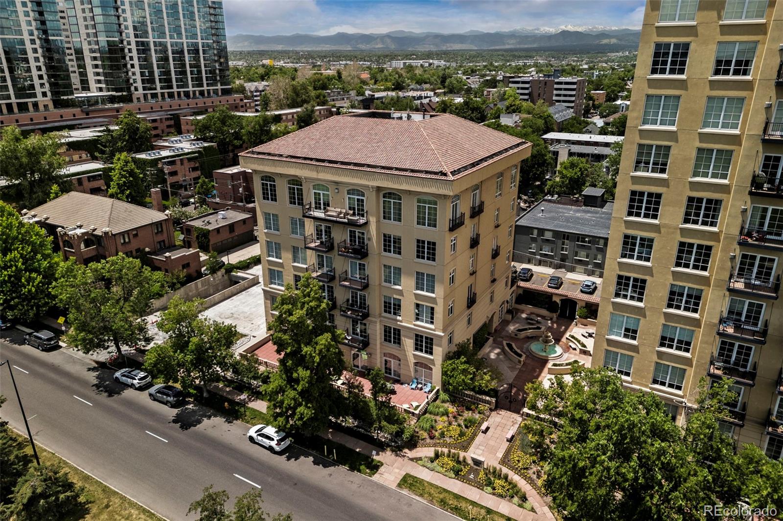 an aerial view of a multi story residential apartment building