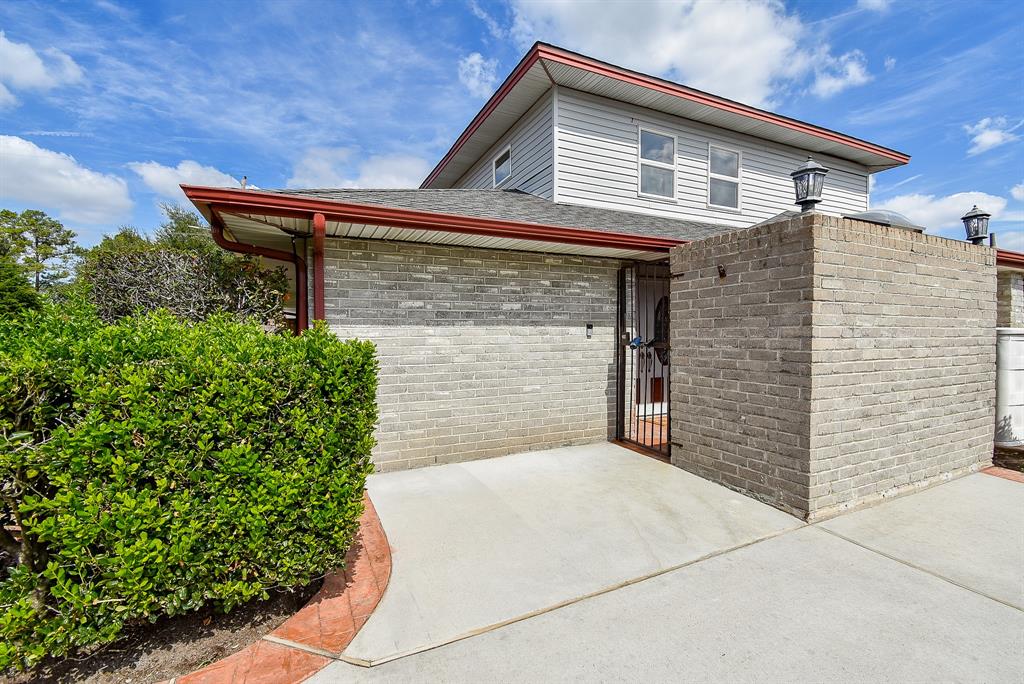 a front view of a house with a garage