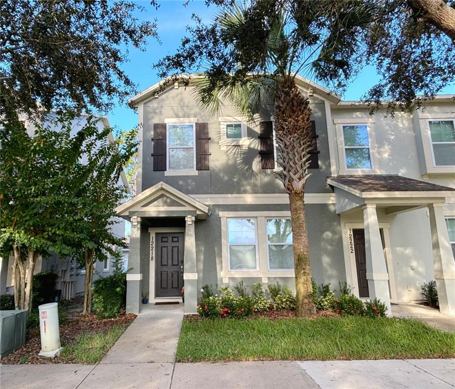 front view of a house with a yard