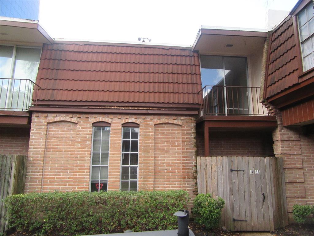 a front view of a house with a garage