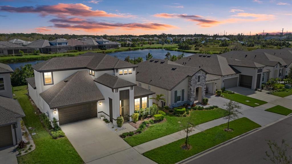 an aerial view of a house with a garden