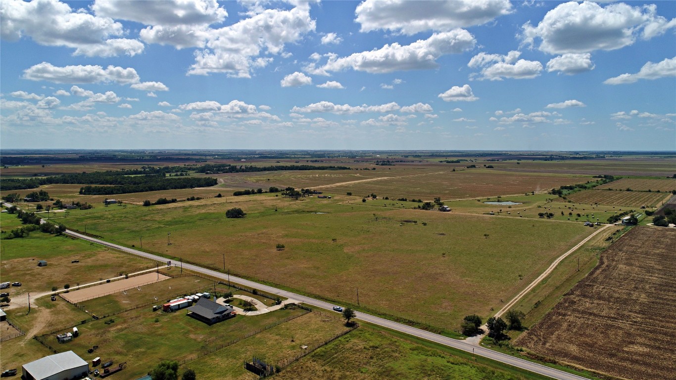 an aerial view of a houses with outdoor space