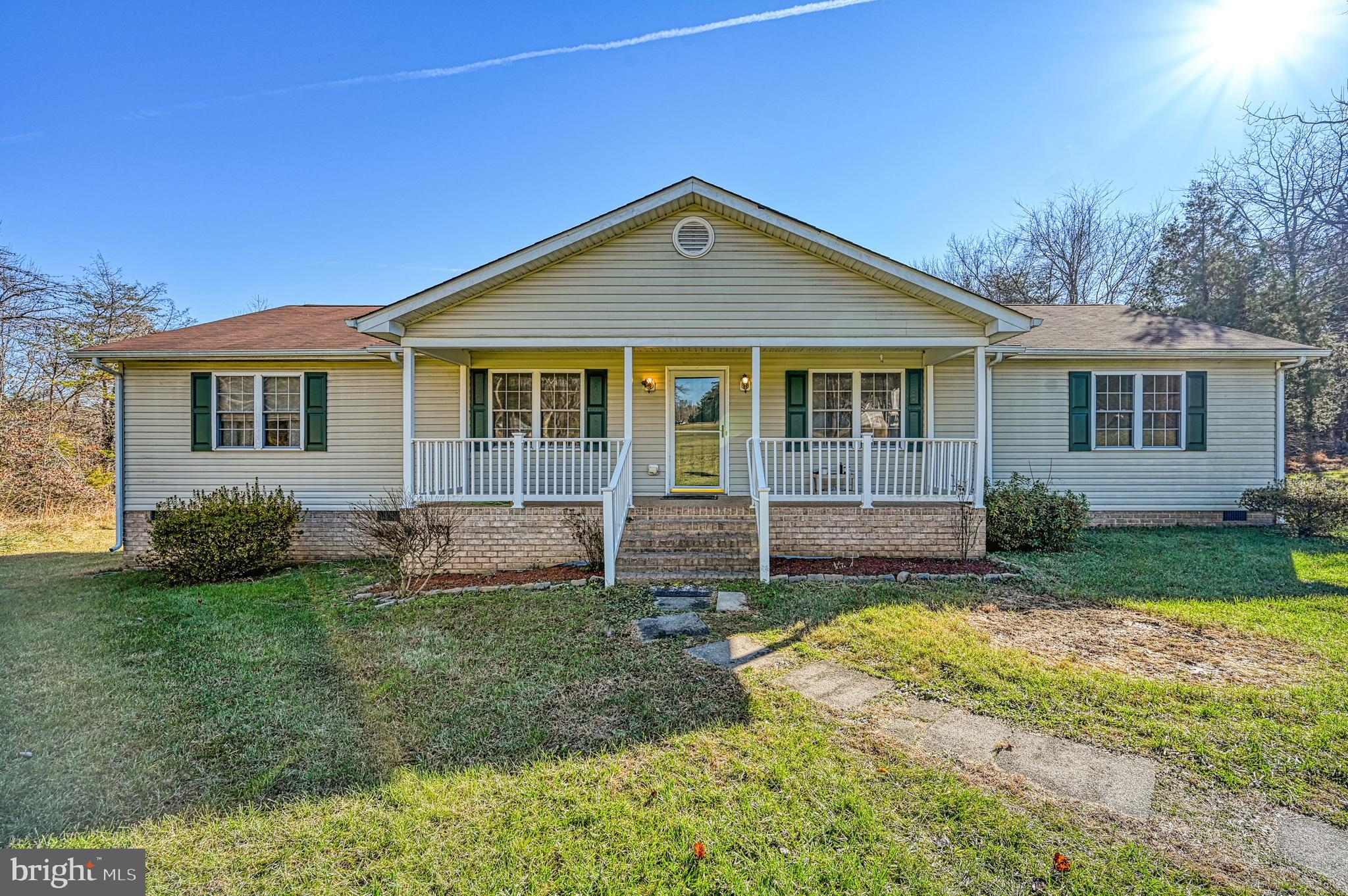 front view of a house and a yard