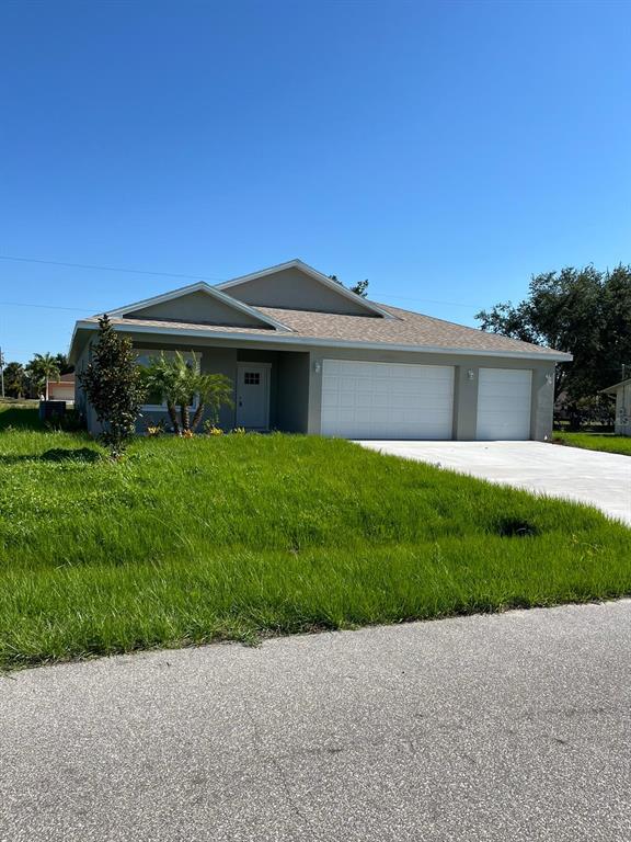 a front view of house with yard