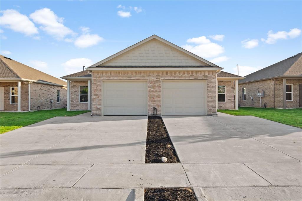 a front view of house with yard