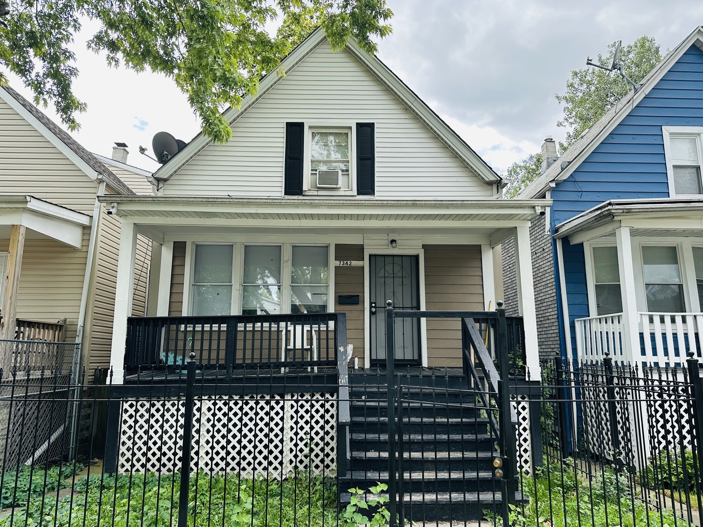 a view of a house with a porch