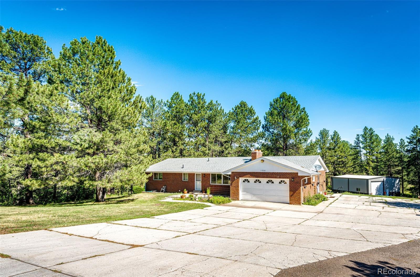 a house with trees in the background