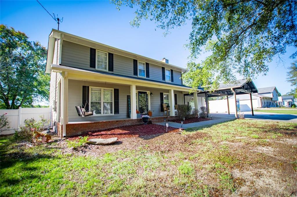 front view of a house with a patio