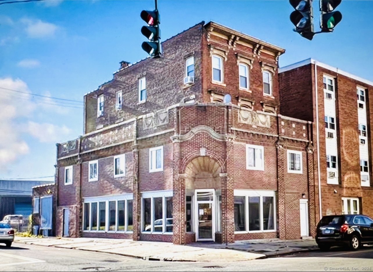 a view of a building in a street