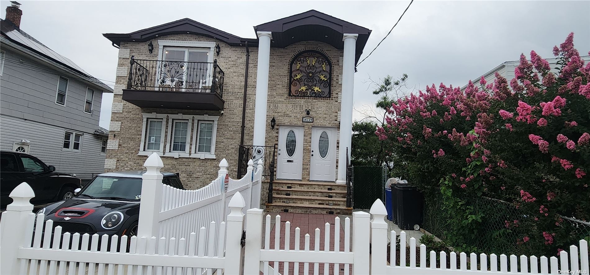 a front view of a house with a porch