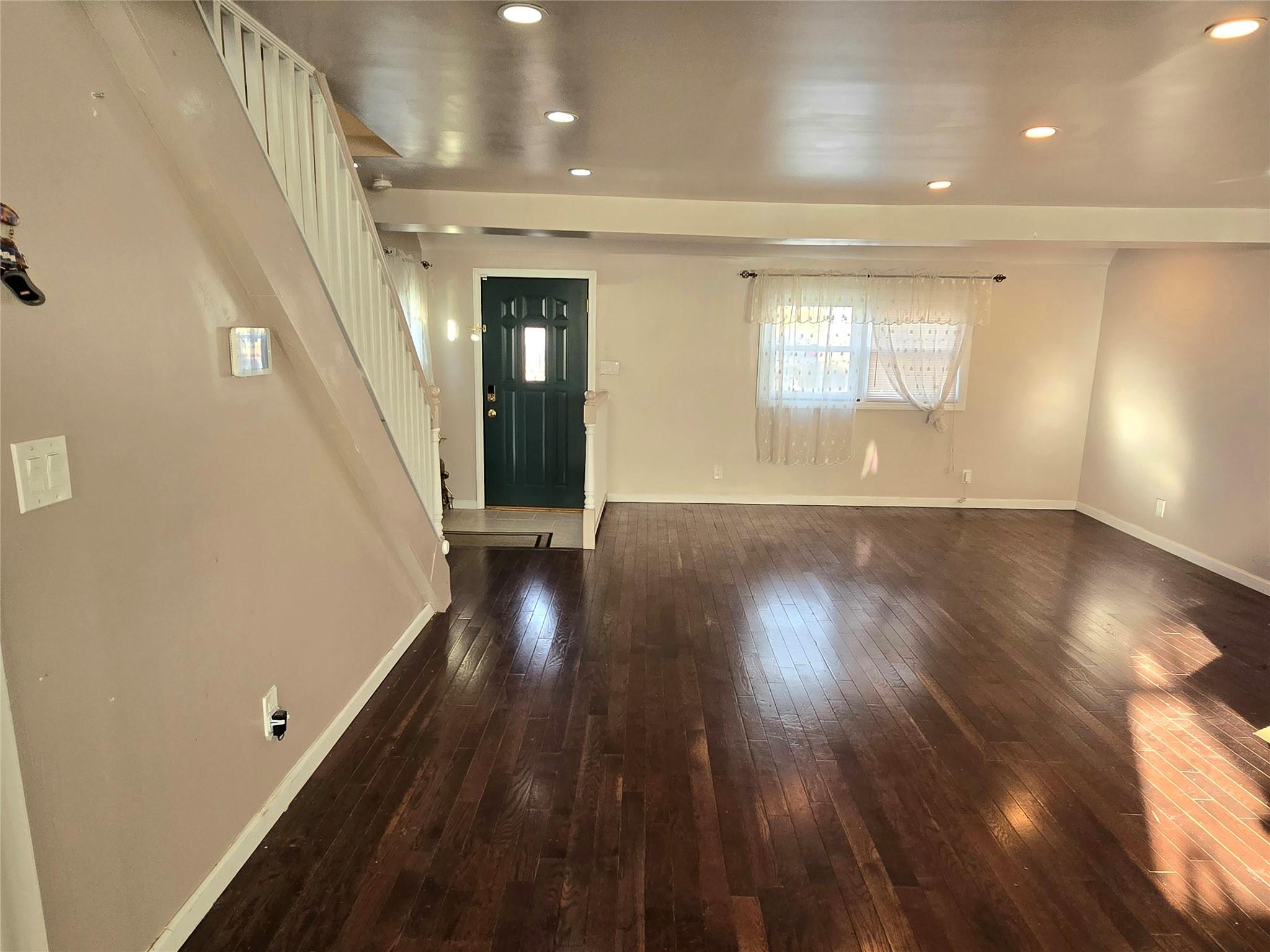 Entryway featuring dark hardwood / wood-style floors