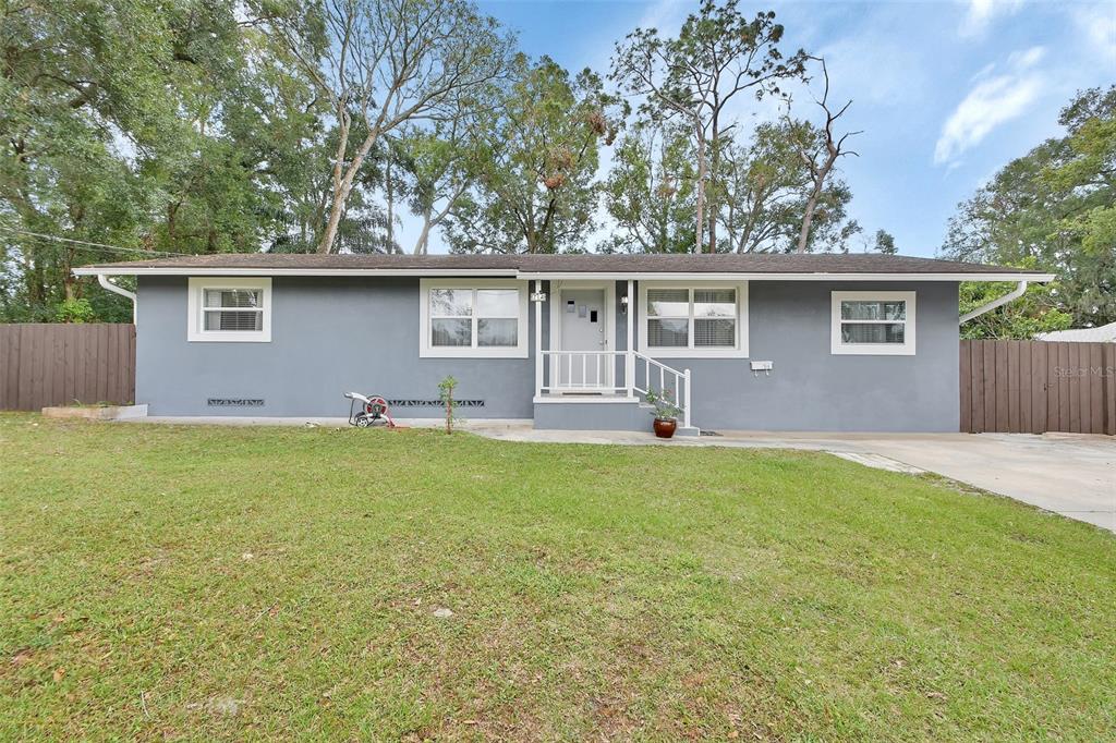 front view of house with a yard