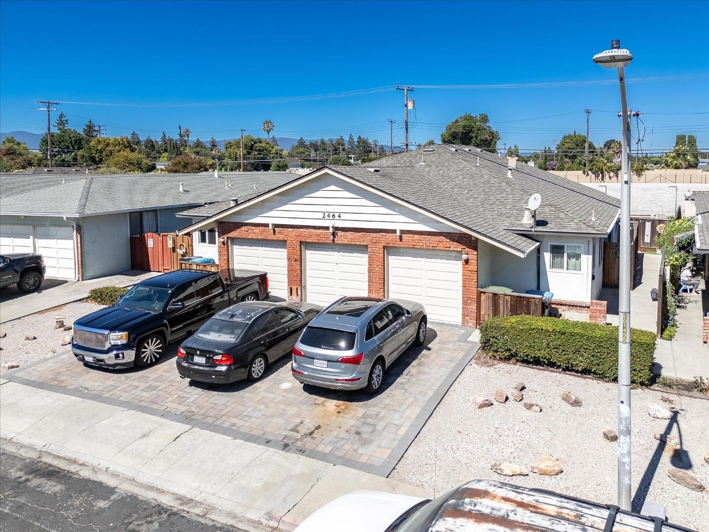 a car parked in front of a house