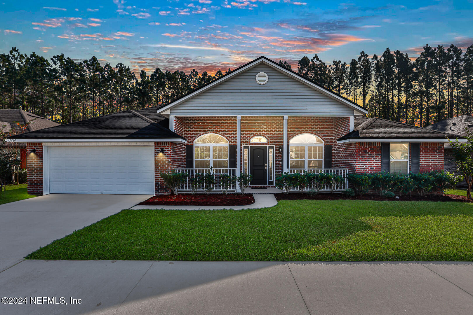 Front of home with brick exterior