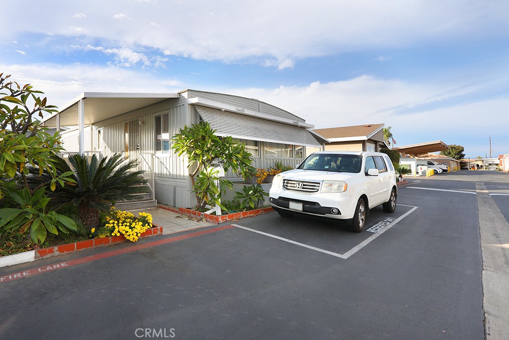 a car parked in front of a house