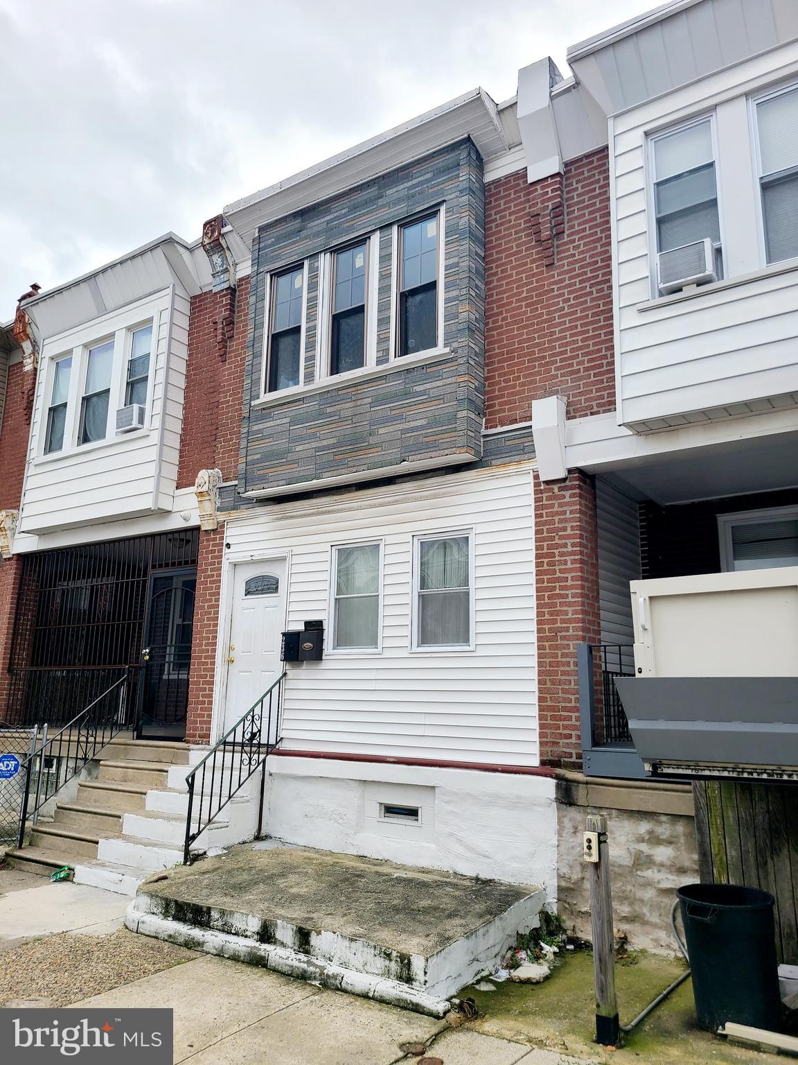 a view of a house with street