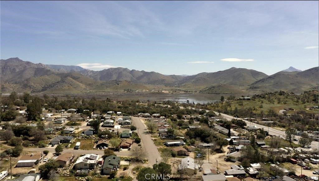 an aerial view of residential house and green space