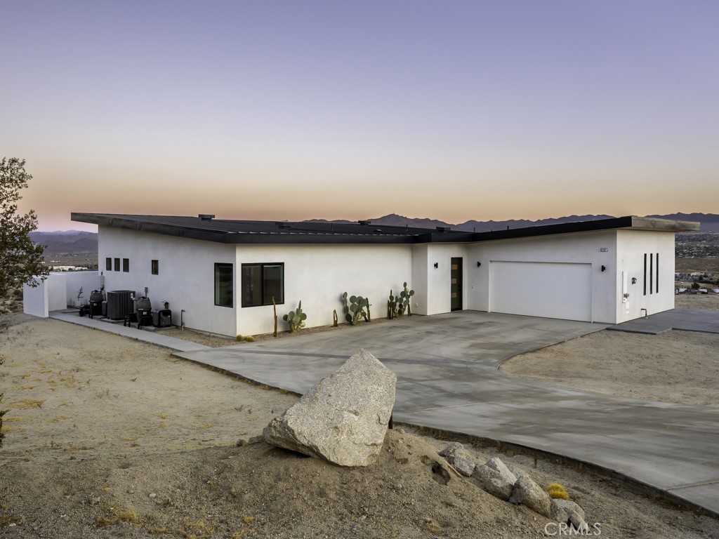 a house view with a outdoor space