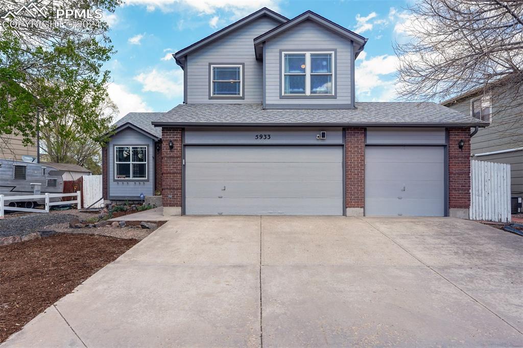 View of front of house with a garage