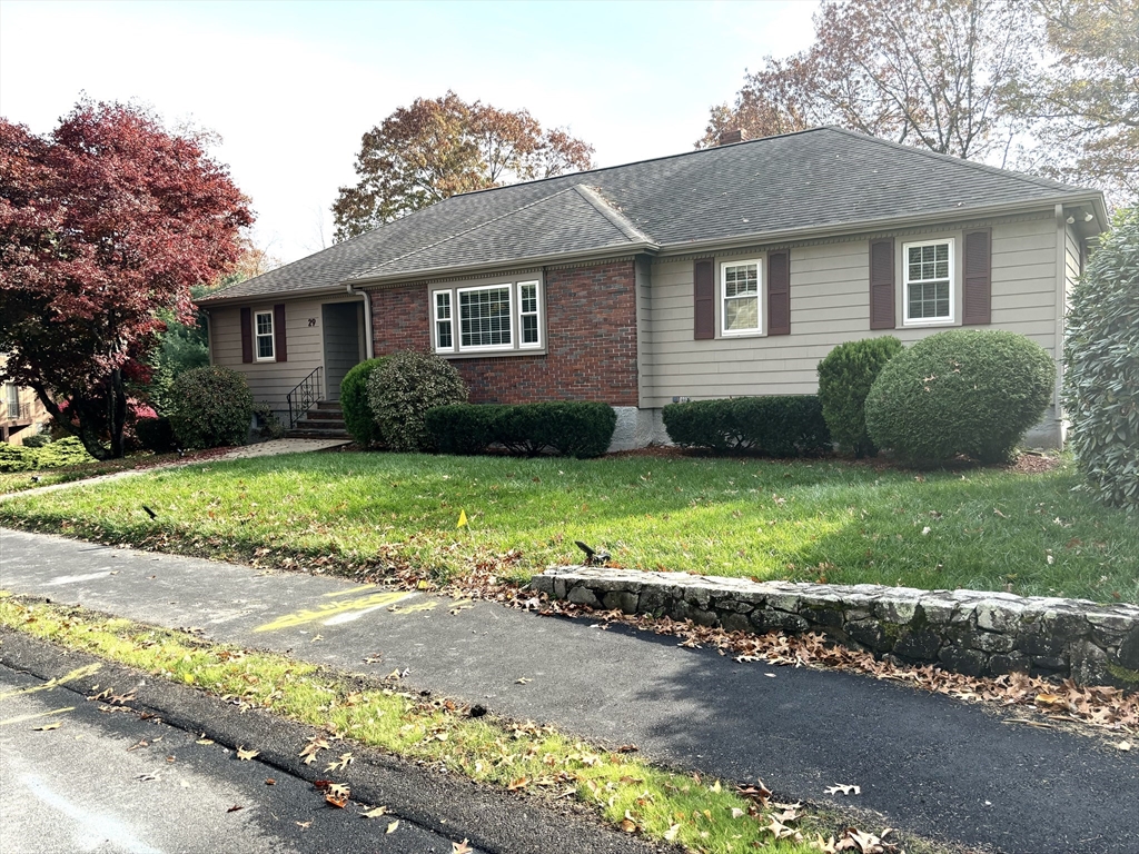 a view of a yard in front of a house