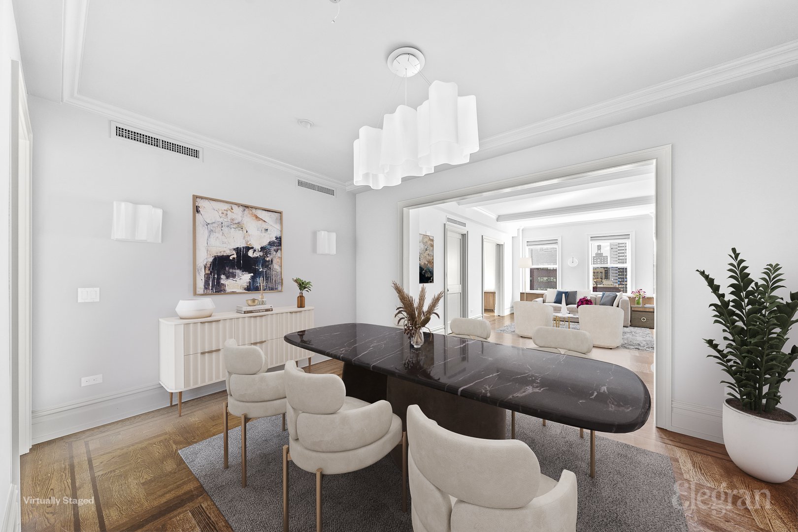 a dining room with furniture and wooden floor