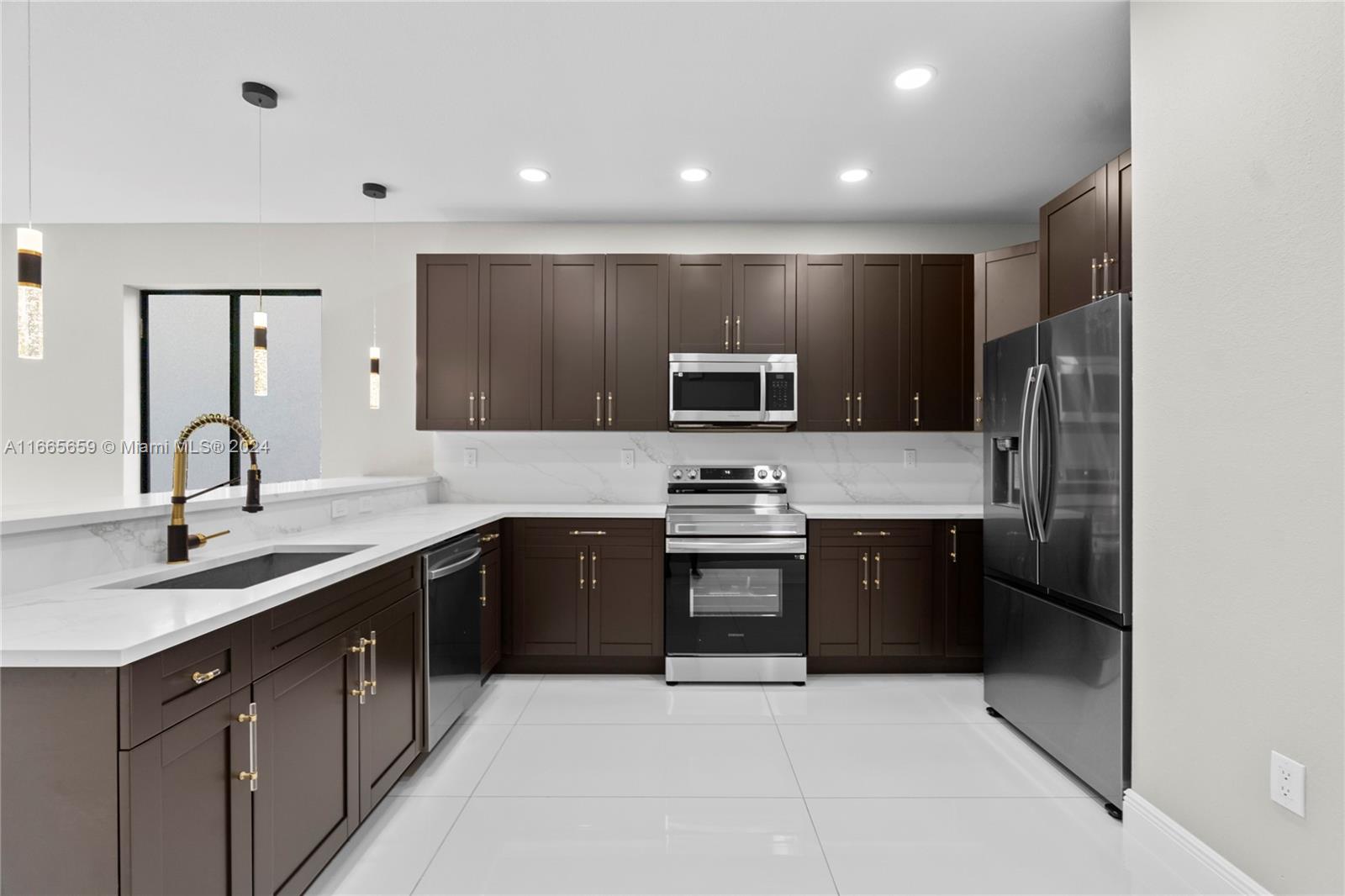 a large kitchen with cabinets