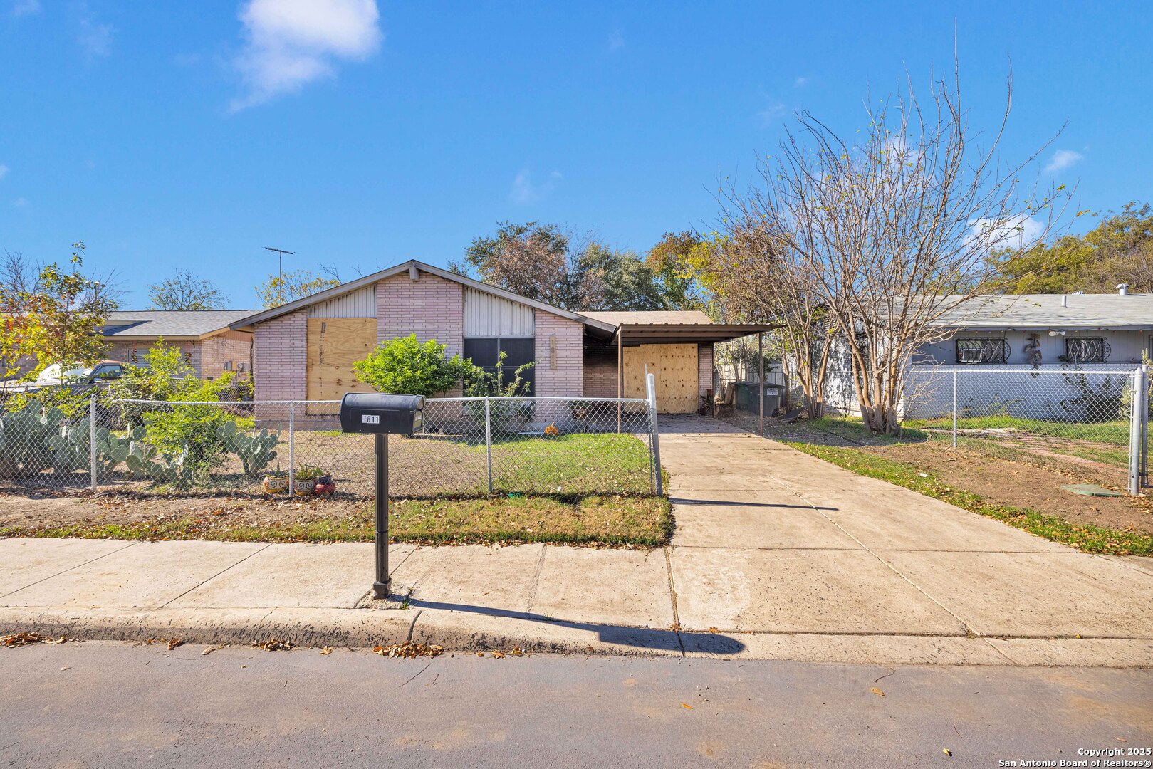 a view of a house with a street