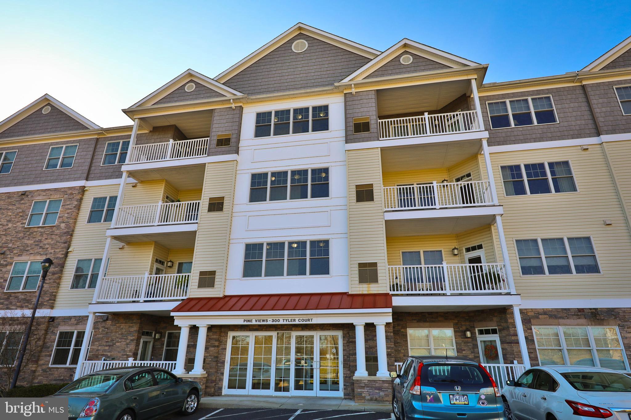 a front view of multi story residential apartment building