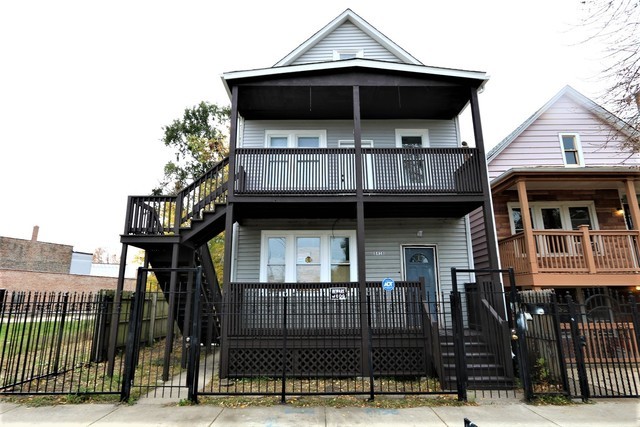 a front view of a house with a porch